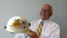 Pedigree: Tony Haggarty shows off the stickers on an old mining helmet.