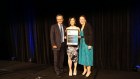 King & Wood Mallesons partners Scott Bouvier and Meredith Paynter, collect their award for the  best provider to the primary industry at the Financial Review Client Choice Awards.  