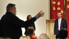 Paul Healey, of Evatt, puts a question to Labor MLA Meegan Fitzharris and MP Andrew Leigh during a community forum.