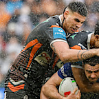 Terrell May (left) was in fine form as the Wests Tigers upset the Bulldogs in round 22.