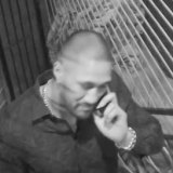 Paea Talakai, 27, speaks on the phone. He has pleaded guilty to affray in the ACT Magistrates Court after a wild bikie brawl in a Canberra strip club, the Capital Mens Club.