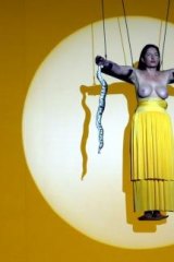 Left hanging: Marina Abramovic performs in <i>The Biography Remix</i> at a theatre festival in France in 2005.