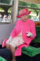 On board ... the monarch aboard a Melbourne tram last year.