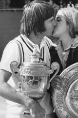 Jimmy Connors kisses his fiancee Chris Evert after winning the men's singles final at Wimbledon on July 6, 1974. Evert had just won the women's singles.