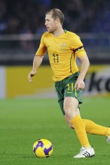 Scott Chipperfield playing for the Socceroos in 2009