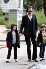 Nick Cave with twin sons Earl (left) and Arthur (right), when they were seven years old.
