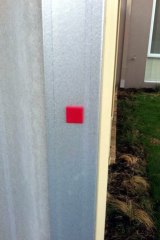 A photo shared on social media is captioned: “These red symbols are tags that people stealing Perth dogs are putting on your gates/fences. These tags identify which house has a dog that needs to be collected later that day/night.”