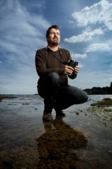 Writer and broadcaster Sean Dooley scans the skies at Ricketts Point.