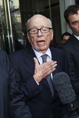 Deeply sorry ... Rupert Murdoch speaks outside the hotel where he met the family of the murdered teenager Milly Dowler.