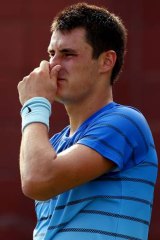 Getting down to serious business: Bernard Tomic.