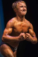 Flexing his muscles: Jake Schellenschlager at the 2013 Musclemania Capitol Tournament of Champions in May.