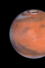 A Hubble space telescope image of Mars, the red planet.