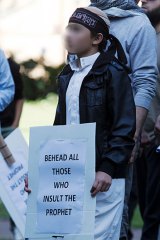 A boy protesting in Sydney on Saturday.