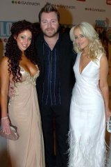 Ladies man … Sandilands with his ex-wife, Tamara Jaber (at left) and Jackie "O" Henderson at the TV Week Logie awards in 2005.
