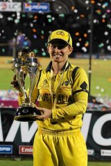 Australian captain Jodie Fields with the World Cup trophy.