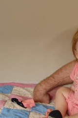 Little Jem … Matt Darling with daughter Jem, the day before her brain surgery.