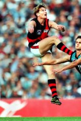 Flying high ... in action with the Bombers in 1997.