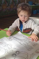 My son Van colouring-in at a recent children's party.