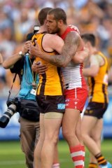 Lance Franklin and Jarryd Roughead hug after the match.