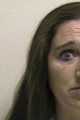 Megan Huntsman was booked into the Utah Country Jail on six counts of murder.