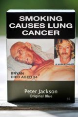 A graphic warning features photos of smoker Bryan Curtis on a packet of cigarettes.