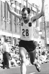 Robert "Deeks" De Castella celebrates victory in the men's marathon at the 1982 Brisbane Commonwealth Games.