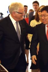 Trade deal: Australian Trade Minister Andrew Robb, left, with his Korean counterpart, He Yoon Sang-jick.