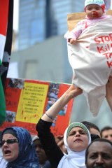 Palestinian supporters hold a protest in Melbourne at Israel's assault on Gaza.