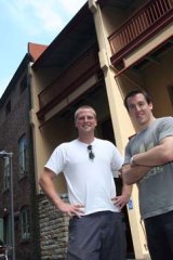 Chris Lane and Luke Heard stand in front of the planned site for their new small bar on Erskine Street in Sydney.