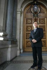 MP Hong Lim, outside Parliament, worries Chinese Australians are invisible in the country's politics.