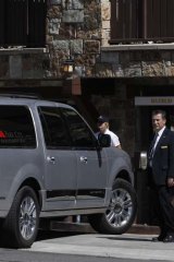 Exclusive ... security officials stand watch as guests arrive at the Chateaux for Republican presidential candidate Mitt Romney's private donor conference.