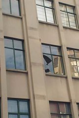 Windows in a Wellington building have broken as a result of the earthquake.