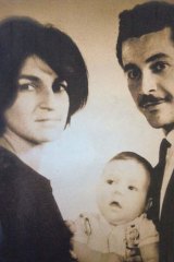 A distant country … Khaled Hosseini as a baby with his parents in Afghanistan.