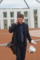 ABC TV political thriller The Code will return for a second season.  Dan Spielman as Ned Banks outside Parliament House.