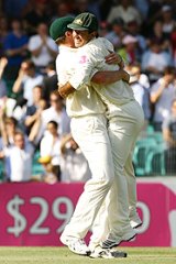 Ricky Ponting and Peter Siddle celebrate their unlikely victory.