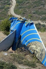 The tail of the crashed Cypriot Helios plane is seen on a hillside in Grammatiko, Greece in 2005.