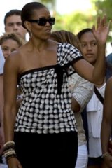 Embarrassment ... Michelle Obama strolls through Marbella.