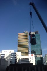 P&K Demolition starts work demolishing the old court complex in Brisbane's CBD.