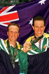 Glory ... Kowalski proudly displays his Olympic silver medal beside golden boy Kieren Perkins after the 1500m freestyle final at the Atlanta Olympics in 1996.