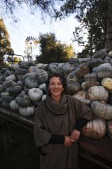 Tania Marshall, one of the original Maules Creek protesters, in front of donated pumpkins.