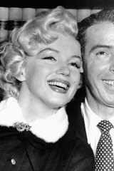 Marilyn Monroe with second husband baseball star Joe DiMaggio on their wedding day: January, 14, 1953.