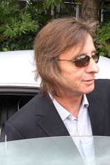 AC/DC drummer Phil Rudd has been questioned by police. 