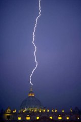 A message from above? ... lightning strikes St Peter's dome at the Vatican hours after Pope Benedict XVI resigned.