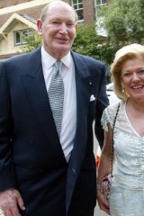 Kerry and Roslyn Packer at the prime minister's Christmas drinks at Kirrabilli House in 2003.