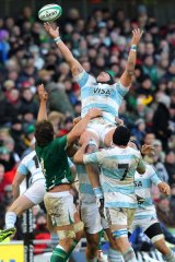 Argentina's Santiago Guzman (top) tries to catch the ball during a lineout.