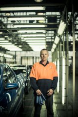 Check, mate … quality checker Tony Poole at Holden's Elizabeth plant in Adelaide's far north.