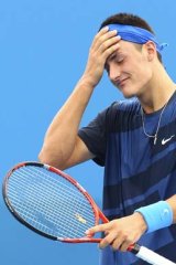 Bernard Tomic's support funding may be cut by Tennis Australia for the start of 2013.