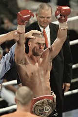 Winner's corner … Taylor wins the IBF Pan Pacific light middleweight title in 2003.