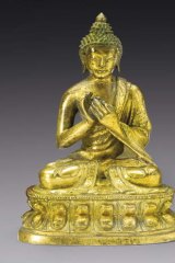 A gilt bronze figure of Buddha from the Qing dynasty, 18th century.