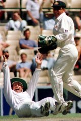 Gotchya ... Australian captain Mark Taylor, left, celebrates the dismissal of Carl Hooperat the SCG in 1996.